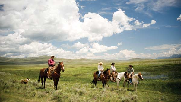 People riding horses on Ranch, Donaldson